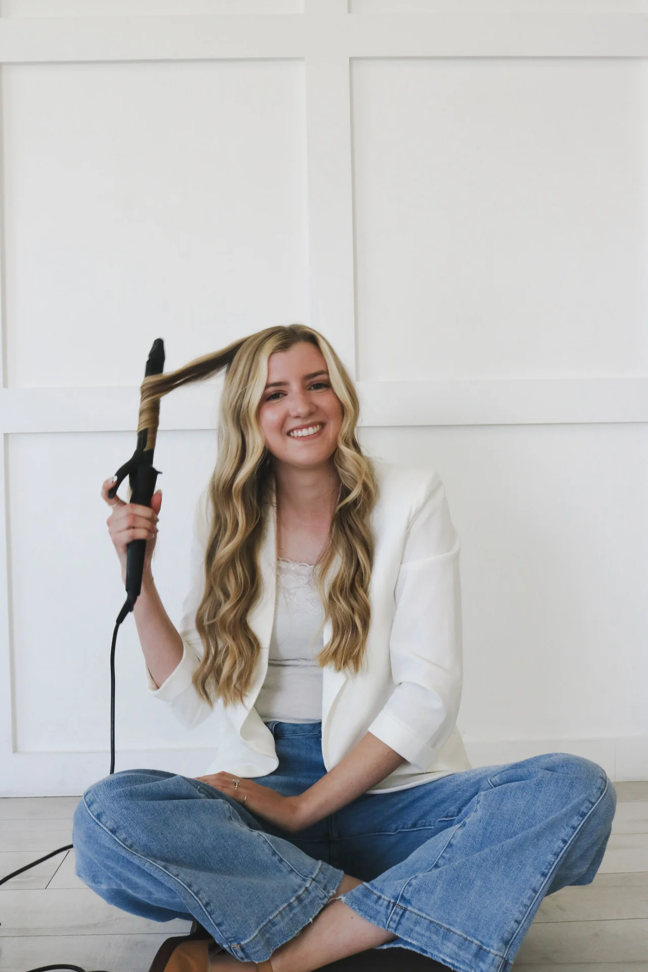Megan Thomas, Orlando Florida bridal hairstylist specializing in wedding curls and updos